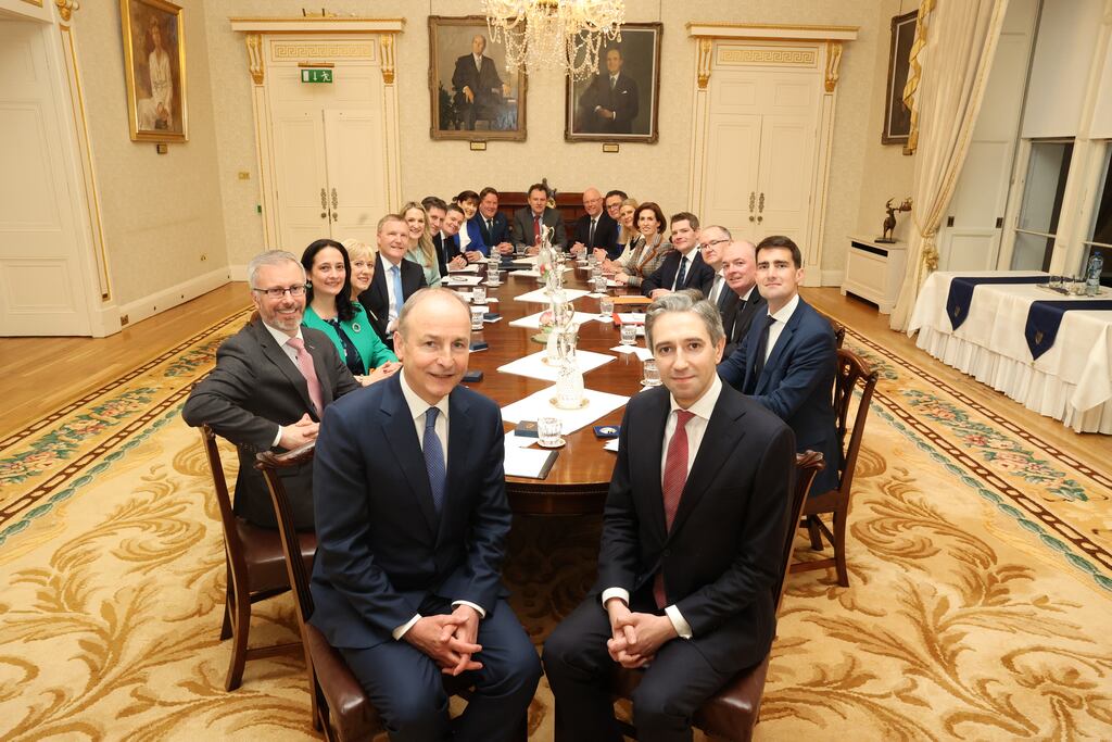 Simon Harris and Micheál Martin with the newly appointed Cabinet last year. Who will be appointed to Cabinet in the new government? 
Photograph: Government Information Service