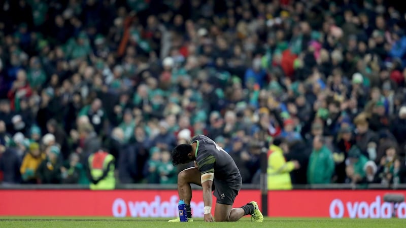 Bundee Aki takes a moment to himself after the game. Photograph: Dan Sheridan/Inpho