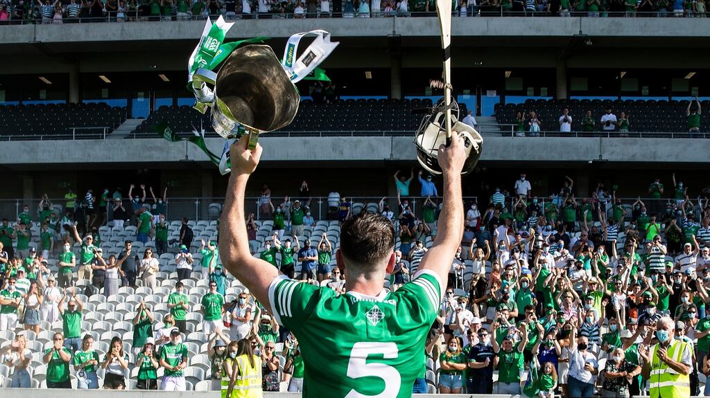 Limerick’s Diarmuid Byrnes with the Mick Mackey Cup after the Munster final. Photograph: Tommy Dickson/Inpho