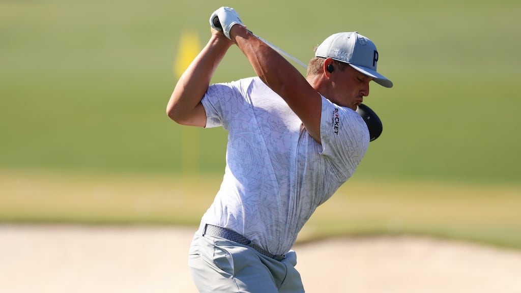 Bryson DeChambeau hits a drive on the range during practice ahead of the Masters at Augusta National Golf Club. Photograph: Mike Ehrmann/Getty Images