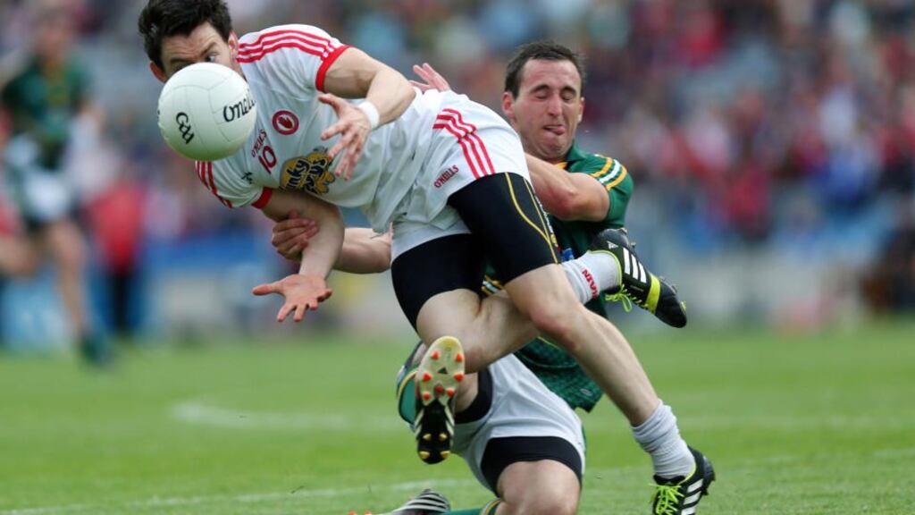 Meath’s Graham Reilly tackles Tyrone’s Matthew Donnelly during the qualifier at Croke Park. Photograph: Donall Farmer/Inpho