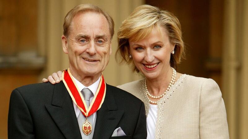The late  Harold Evans at Buckingham Palace in London with his wife, Tina Brown, after he was knighted by the Prince of Wales for service to journalism in 2004. Photograph: John Stillwell / PA Wire
