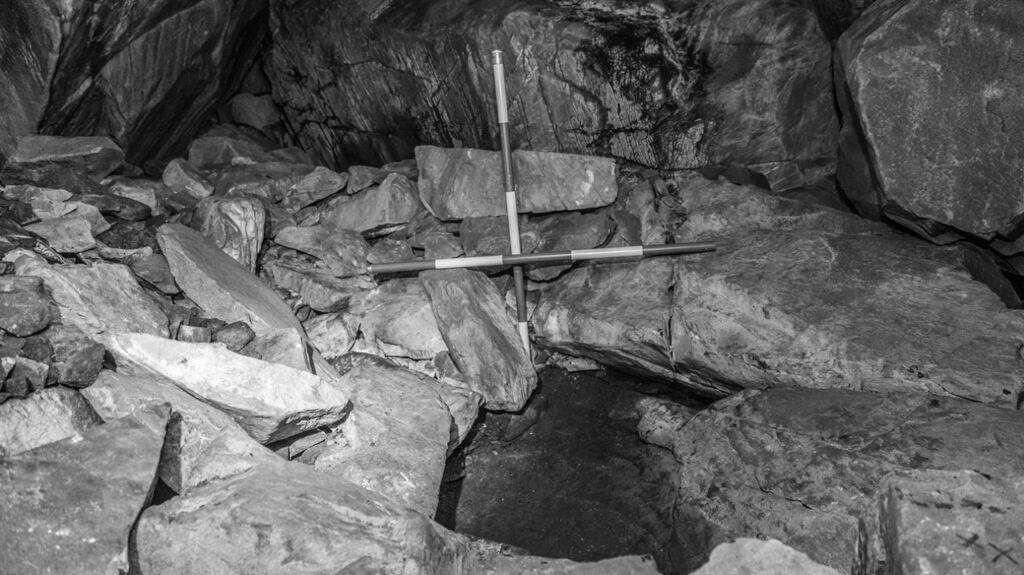 The pit in the cave which contained human remains after the excavation. Photograph: Department of Culture, Heritage and the Gaeltacht