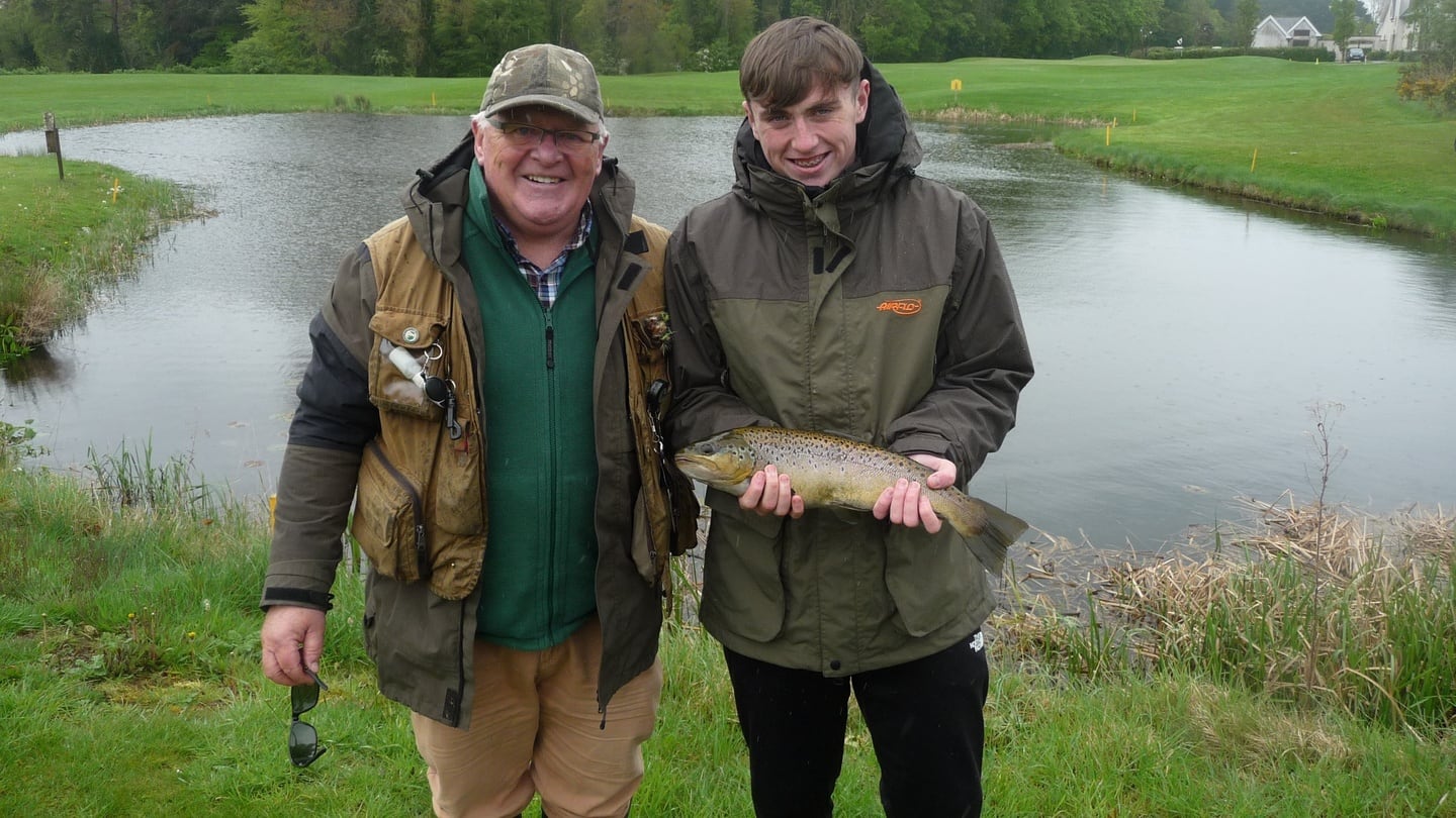 Aaron O’Neill (16) with 3lb trout at the K Club, alongside estate fisheries manager John O’Neill
