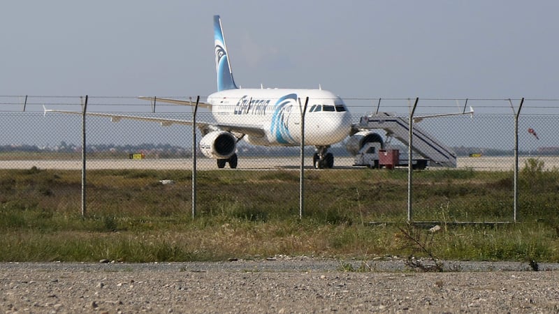 An Egypt Air Airbus A-320 sits on the tarmac of Larnaca airport after it was hijacked and diverted to Cyprus. Photograph: STRSTR/AFP/Getty Images
