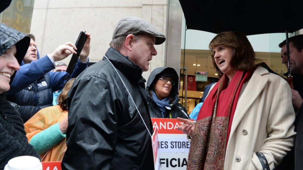 Tánaiste Joan Burton meets striking Dunnes Stores workers and union representatives on the picket line at Henry Street in Dublin. Photograph: Eric Luke/The Irish Times