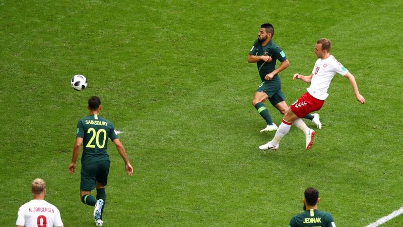 Christian Eriksen opens the scoring for Denmark in their 1-1 draw with Australia. Photograph: Dean Mouhtaropoulos/Getty