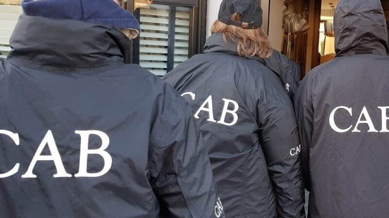 Officers from the Criminal Assets Bureau carried out searches on Tuesday at a Dublin home as part of an on-going investigation targeting the proceeds of crime. Photograph: An Garda via Facebook