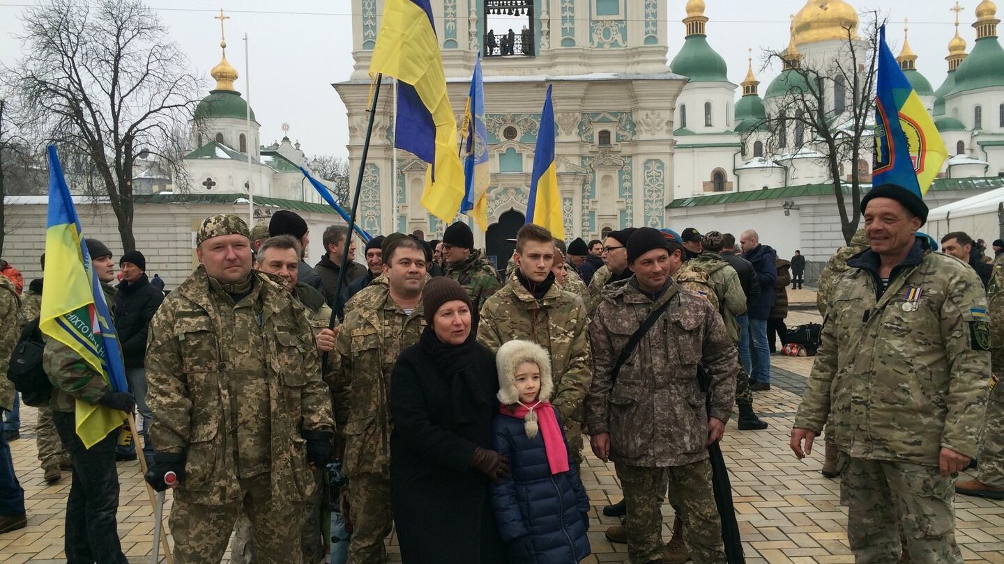 Serhiy (far left) and other Ukrainian soldiers and their supporters at a concert in Kiev on Saturday in memory of servicemen killed in the 2015 Battle of Debaltseve. Photograph: Daniel McLaughlin