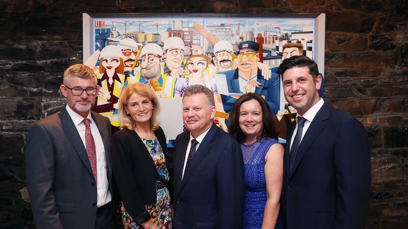 Mary Buckley, executive director of IDA Ireland (second from left) joins Nigel Spence, managing director of KMCS (centre), to welcome new company directors Colm Larkin, Eileen Finn and Andrew Gargan. Photograph: Julien Behal Photography