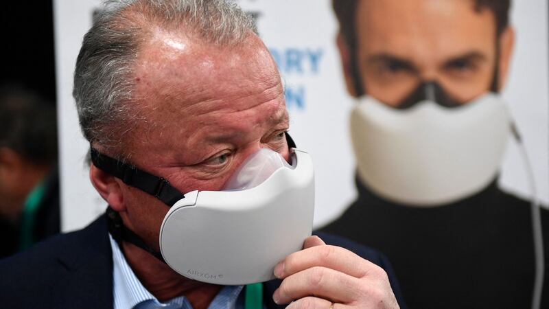 Franck Glaizal, chief executive and co-founder, demonstrates the Airxom mask for active protection from the effects of air pollution, bacteria, and viruses including Covid-19 during CES Unveiled ahead of the Consumer Electronics Show in Las Vegas. Photograph: Patrick Fallon / AFP via Getty Images