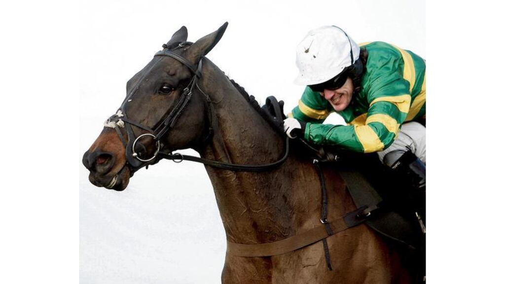 Can't Buy Time, ridden by Tony McCoy, on the way to victory in the Handicap Chase at Cheltenham yesterday.