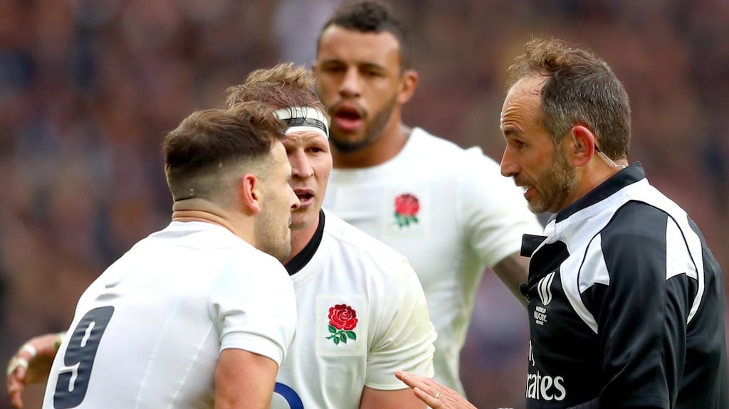 Romain Poite speaks to Danny Care and Dylan hartley during England’s Six Nations win over Italy. Photograph: James Crombie/Inpho