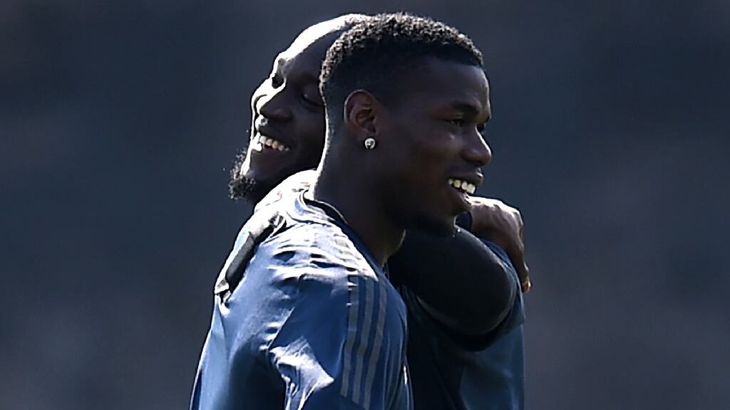 Paul Pogba and Romelu Lukaku warm-up during Manchester United’s training session at Carrington on Tuesday ahead of the Champions Cup quarter-final first leg against Barcelona at Old Trafford on Wednesday night. Photograph: Oli Scarff/AFP/Getty Images
