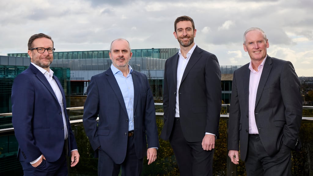 Regan Wall founder and managing partner Adrian Wall, left, with Feilim O'Caoimh, Fieldfisher corporate partner, Kieran Regan, a partner with Regan Wall, and JP McDowell, Fieldfisher's managing partner.