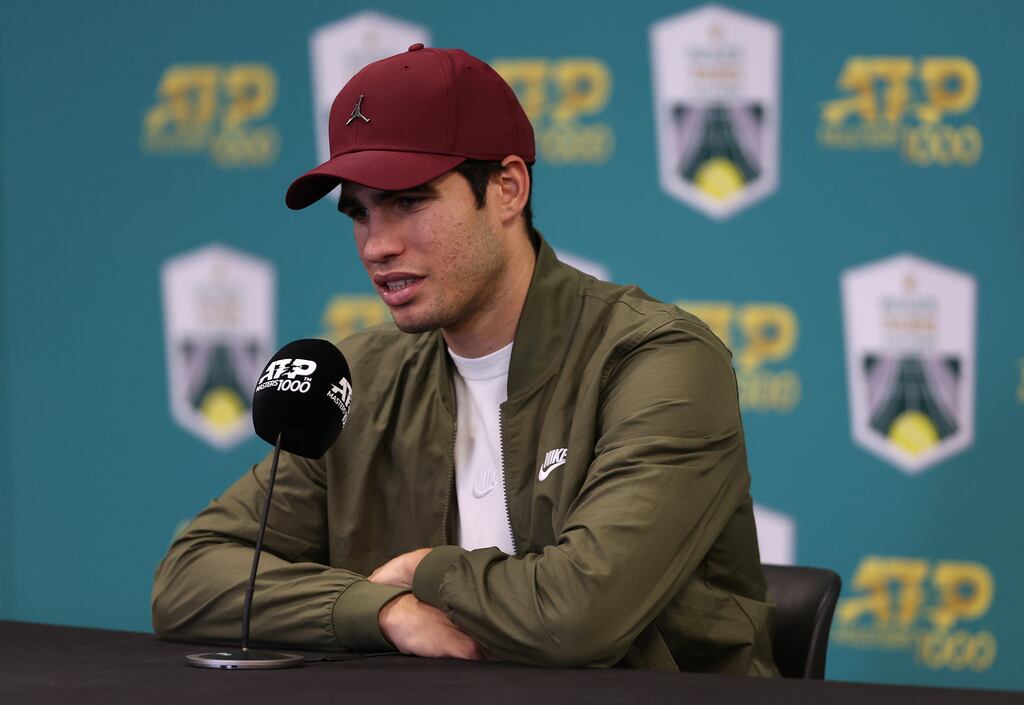 PARIS, FRANCE - NOVEMBER 04: Carlos Alcaraz of Spain talks to media after retiring injured against Holger Vitus Nodskov Rune of Denmark in the Quarter finals during Day Five of the Rolex Paris Masters tennis at Palais Omnisports de Bercy on November 4, 2022 in Paris, France. (Photo by Julian Finney/Getty Images)