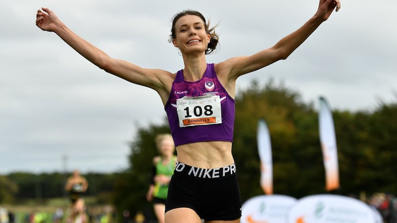 Abbie Donnelly celebrates winning the Senior Women’s 6000m race. Photo: Sam Barnes/Sportsfile