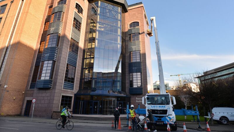 The statue being removed from the Treasury Building in Dublin’s Grand Canal Street Lower. Photograph: Alan Betson