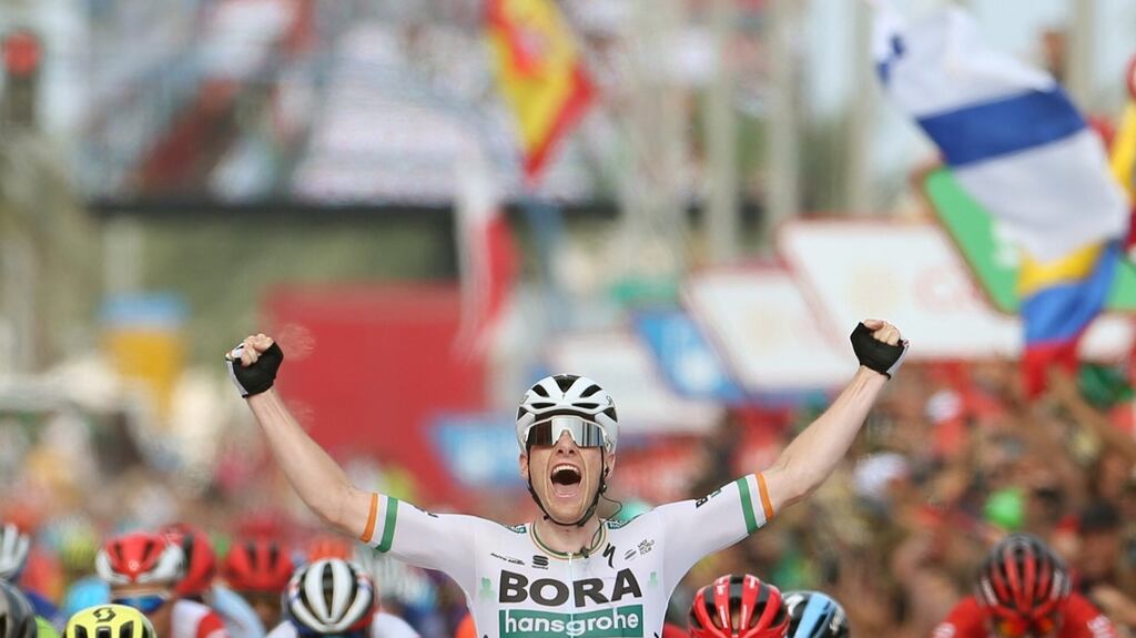 Irish cyclist Sam Bennett of Bora-Hansgrohe team celebrates winning the third stage of the La Vuelta cycling race, over 188km between Ibi and Alicante, eastern Spain. Photo: Javier Lizon/EPA