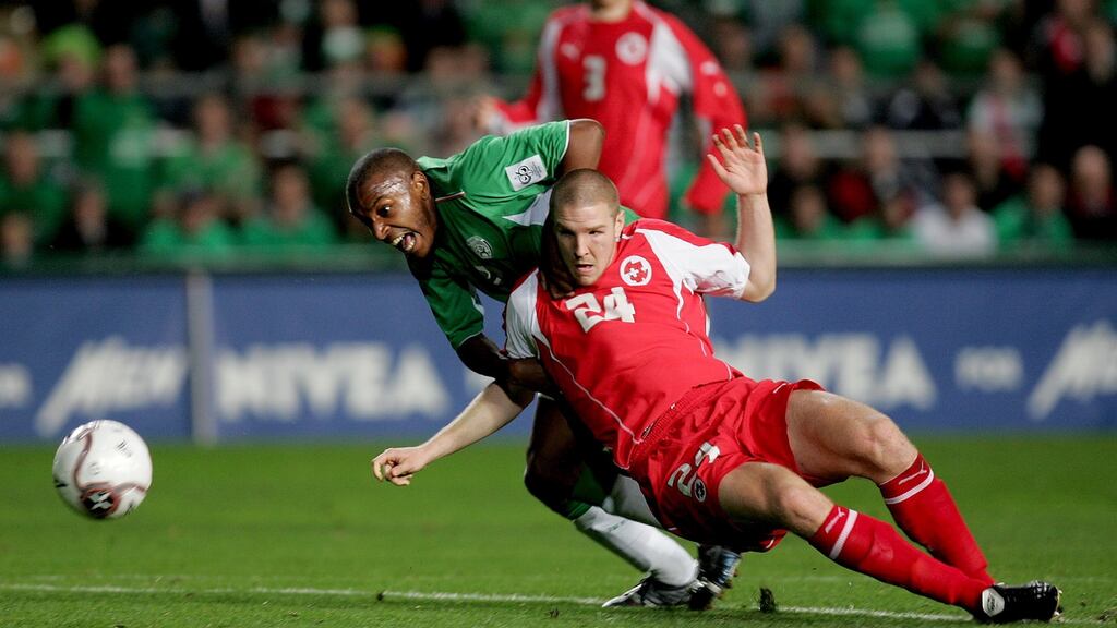 Clinton Morrison tussles with Phillipe Senderos during Ireland’s last meeting with Switzerland in 2005. Photograph: Inpho