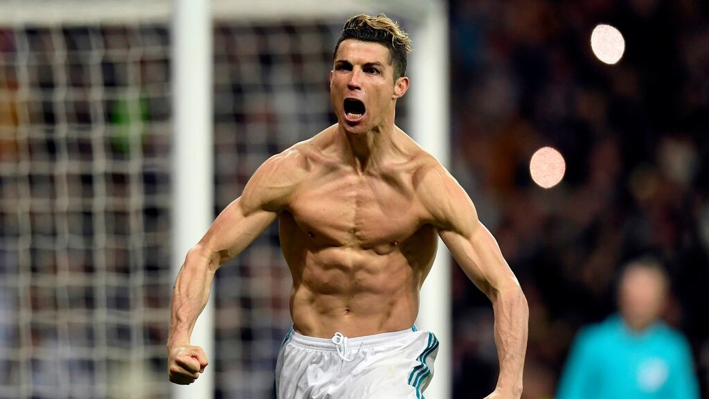 Real Madrid’s Cristiano Ronaldo celebrates after scoring the decisive penalty in an epic clash against Juventus. Photograph: Oscar Del Pozo/AFP/Getty