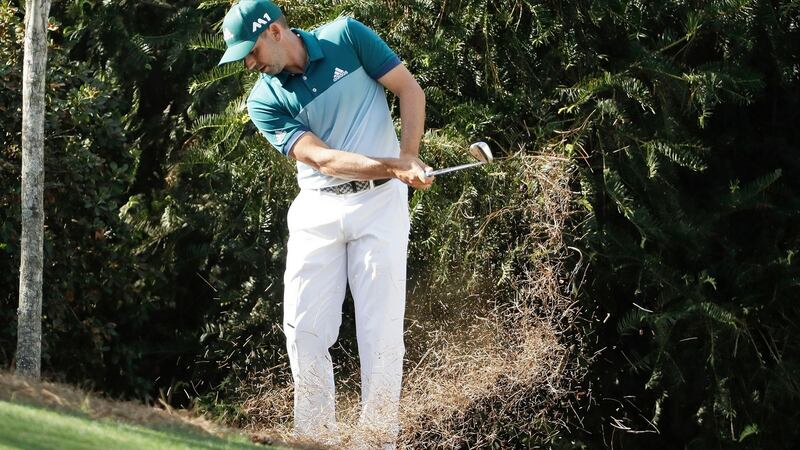 Garcia hits from the pine straw on the 10th hole. Photo: David J. Phillip/AP