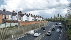 I want to build a high wall to drown out traffic noise. Do I need planning permission?