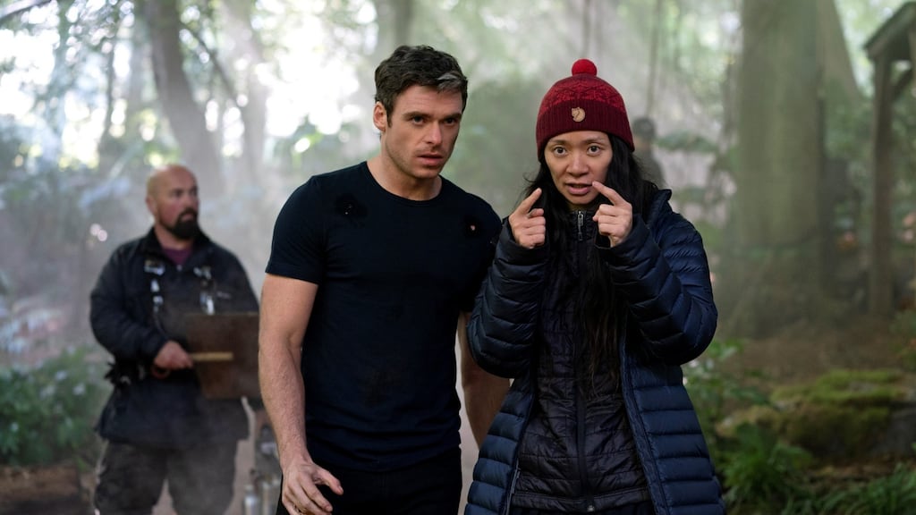 Richard Madden and Chloé Zhao on the set of Eternals. Zhao says, as a fan of the MCU, she wanted to satisfy the fans