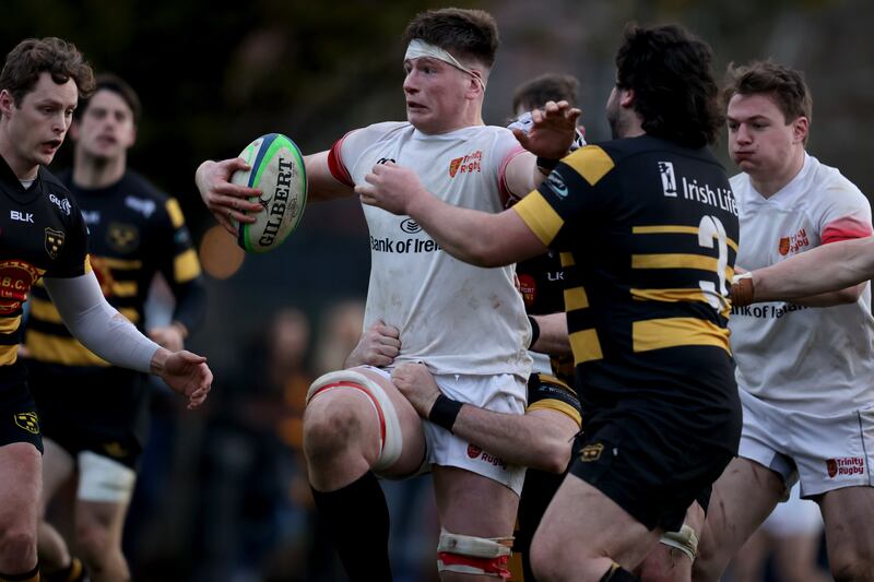 Dublin University's Joe McCarthy runs with the ball. Photograph: Tom Maher/Inpho