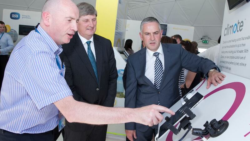 Pictured left to right: Derek Roddy, chief executive of Climote, showcasing his product to Pat O’Doherty, chief executive of ESB and Paul Mulvaney, executive director of innovation at ESB.