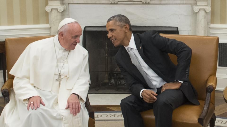 US president Barack Obama talks with Pope Francis during a meeting in the Oval Office. Photograph: Getty