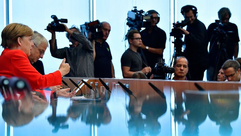 German chancellor Angela Merkel addresses the media during her traditional annual summer press conference in Berlin on August 29th. Photograph: Slchwarztobias Schwarz/AFP/Getty Images