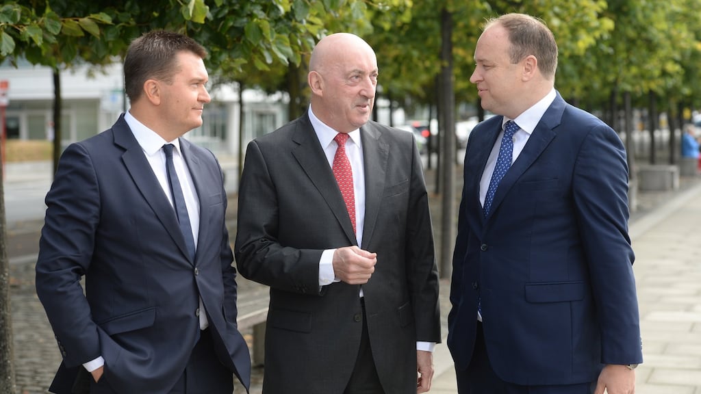 Justin Bickle, outgoing chiuef executive, John Mulcahy, chairman, and Stephen Garvey, incoming chief executive.