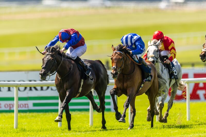 Ryan Moore on Los Angeles wins The Tattersalls Gold Cup on Sunday, beating Jim Crowley on Anmaat. Photograph: Morgan Treacy/INPHO