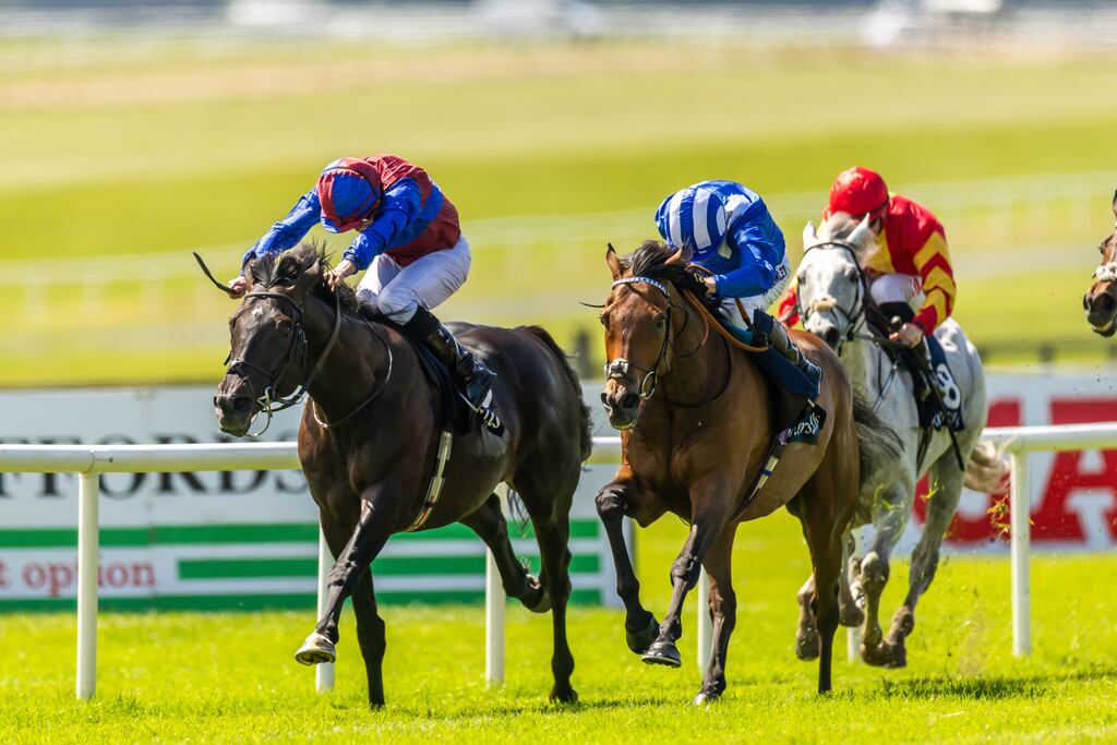 Ryan Moore wins The Tattersalls Gold Cup on Los Angeles, ahead of Jim Crowley on Anmaat, at the Curragh in May. Photograph: Morgan Treacy/Inpho