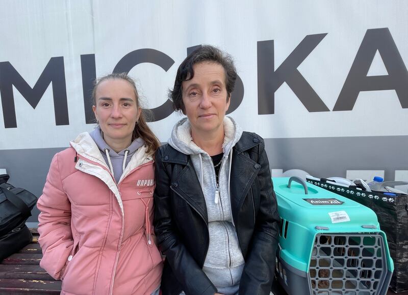 Svitlana (right) and daughter Karina in Kyiv-held Zaporizhzhia city after fleeing with their dog and cat from Russian-controlled Nova Kakhovka in Kherson region. Photograph: Daniel McLaughlin