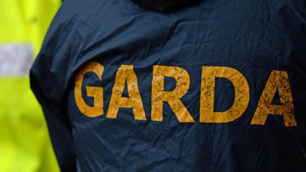 Gardai arrested a man who fired shots into a house before attempting to flee the scene on a bicycle last night.