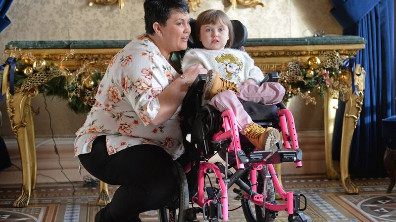 Kildare Carer of the Year Lynnmarie Walsh, who looks after her daughter Jessica (8), at the Carers of the Year Awards, in Dublin. Photograph: Eric Luke