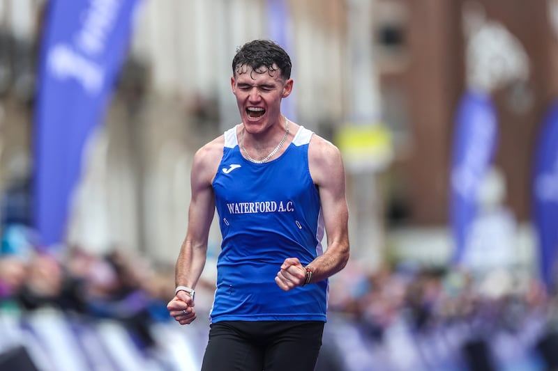 David MccGlynn celebrates after winning the men's national title. Photograph: Bryan Keane/Inpho