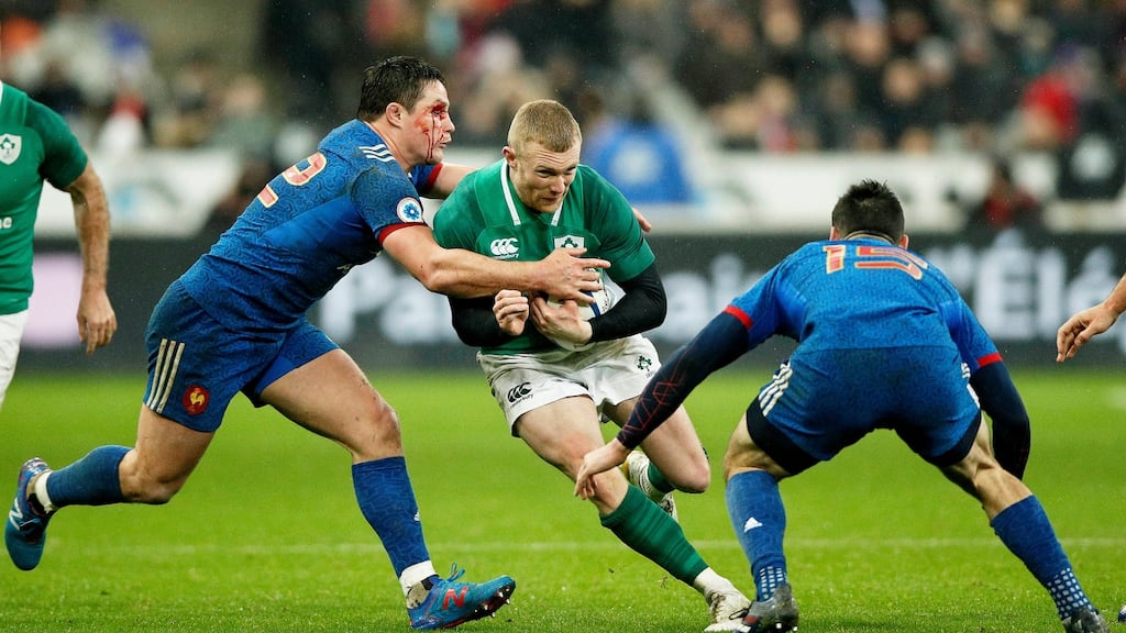 Ireland’s Keith Earls is tackled by France’s Henry Chavancy and Geoffrey Palis at the Stade de France. “It’s a crazy game. It does strange things to you. ” Photograph: Voan Valat/EPA