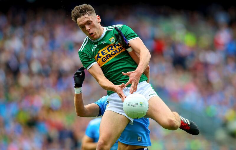 Dublin's Jonny Cooper with David Clifford of Kerry. Photograph: Tommy Dickson/Inpho