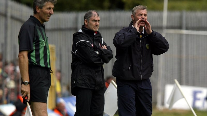 Mickey Harte with Donegal manager Brian McEniff during the Ulster semi-final clash in 2004 which Donegal won. Photograph: Andrew Paton/Inpho