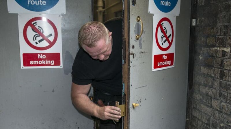 The locks being changed on the backdoor of Clery’s department store tonight. Photograph: Dave Meehan