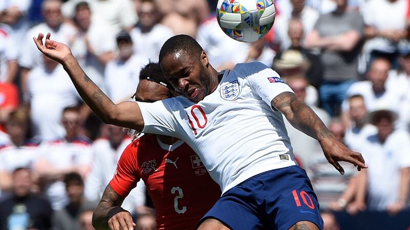 Raheem Sterling challenges Kevin Mbabu during England’s penalty shotoout win over Switzerland. Photograph: Miguel Riopa/AFP/Getty