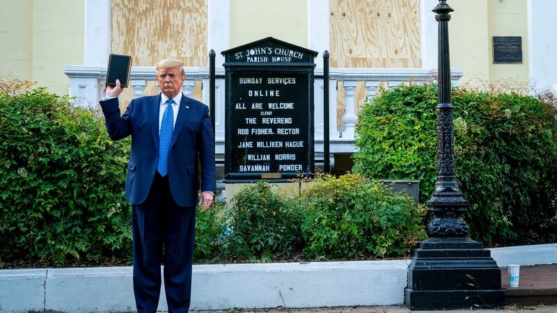 US president Donald Trump holds a bible, for a photo opportunity, as he stands outside the boarded up St John’s Episcopal Church in Washington on June 1st. Photograph: Doug Mills/The New York Times