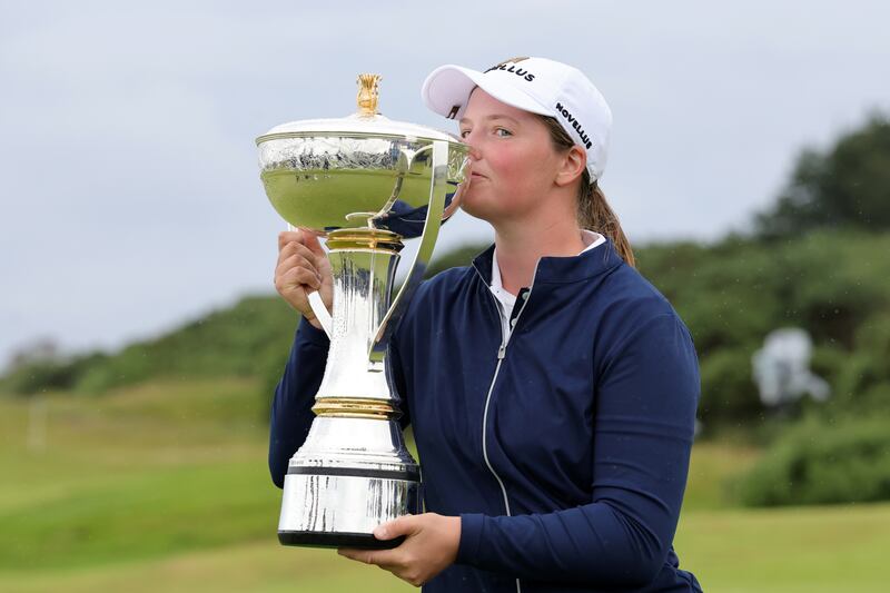 England's Lottie Woad kisses the trophy after winning the ISPS Handa Women's Scottish Open at Dundonald Links in Irvine. Photograph: Steve Welsh/PA Wire