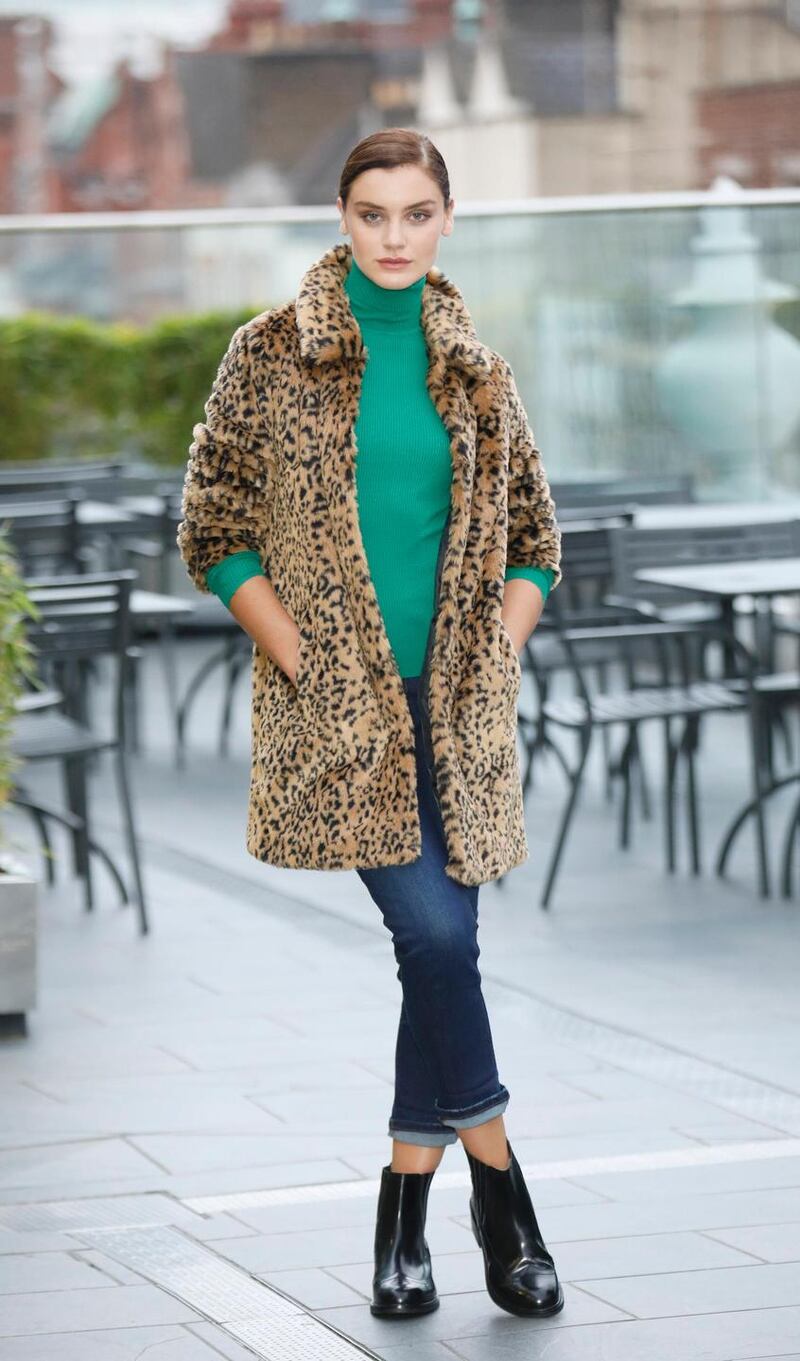 Leopardprint faux fur coat, €110; relaxed slim leg jeans, €34; ribbed polo neck, €24