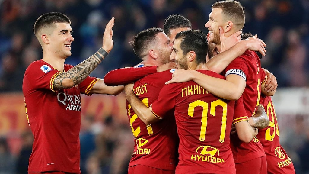 Roma’s Edin Dzeko (right) celebrates with team-mates after scoring his side’s third goal in the Serie A match against US Lecce at the Stadio Olimpico in February. Photograph: Riccardo Antimiani/EPA