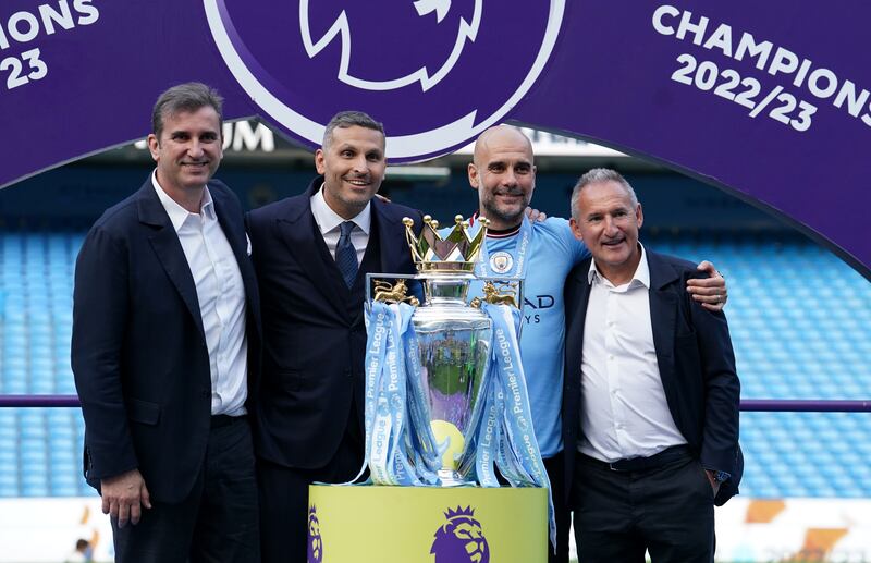 Manchester City CEO Ferran Soriano, chairman Khaldoon Al Mubarak, manager Pep Guardiola and director of football Txiki Begiristain with the Premier League winner's trophy. Photograph: Martin Rickett/PA Wire