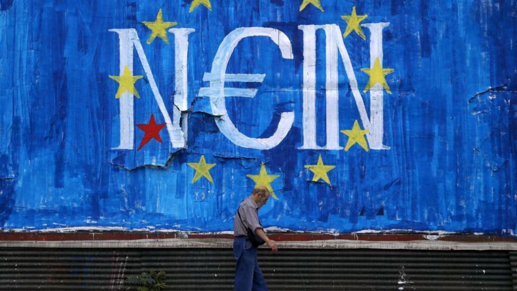 Anti-EU graffiti in Athens: banks in Greece are closed today, with no word on when they might reopen. Photograph: Alkis Konstantinidis/Reuters